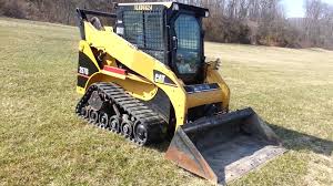 Chargeuse compacte Delta CAT 257B vue latérale